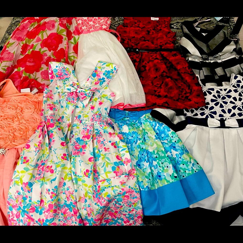 A lot of dresses varying size 7- 10! Many never worn!